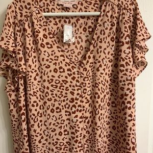 Leopard print blouse in peachy/pink. 1x